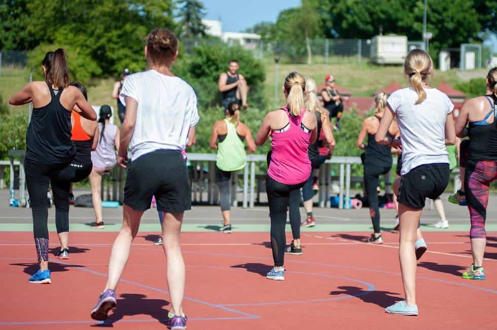 Group exercising outdoors